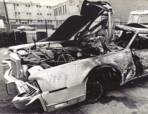 A bombed out car in the 1960s