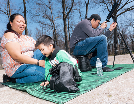 A family prepares to view the eclipse