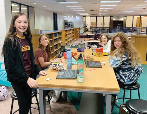 academic-excellence_article Students working at a table
