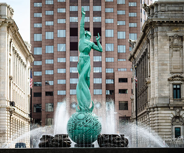 Cleveland Fountain of Eternal Life Memorial Plaza History Design Statue Green man on ball fountain Cleveland Square meaning