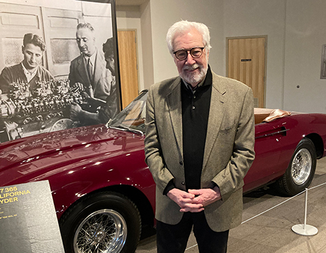 Dennis Barre in front of a classic car.