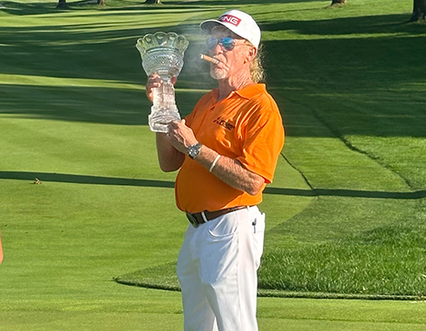 Miguel Angel Jimenez holding the trophy at Firestone Country Club Miguel Angel Jimenez holding the trophy at Firestone Country Club
