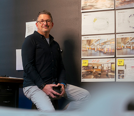 Scott Richardson with mock ups of his designs