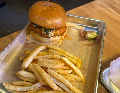The Cleveland Hot Chicken Sandwich and fries. The Cleveland Hot Chicken Sandwich and fries.