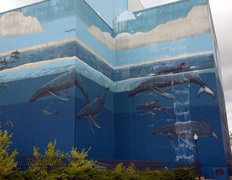 whaling wall_ in Cleveland Ohio North Marginal Road Cleveland Public Power Building what building has the whales on it on Interstate 90 why are there whales on a building in cleveland painting mural painted