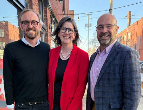 Andy Trares, Executive Director of the May Dugan Center; John Litten, President and CEO of Greater Cleveland Habitat for Humanity; and Kristin Warzocha, President and CEO of the Greater Cleveland Food Bank.