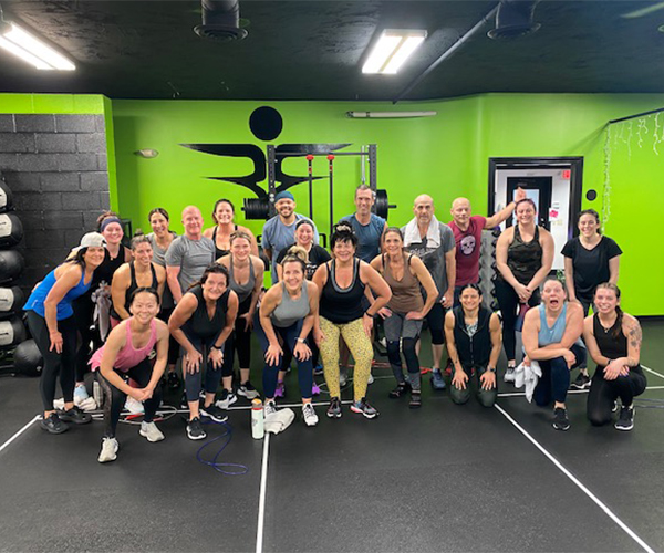 People posing at a fitness class