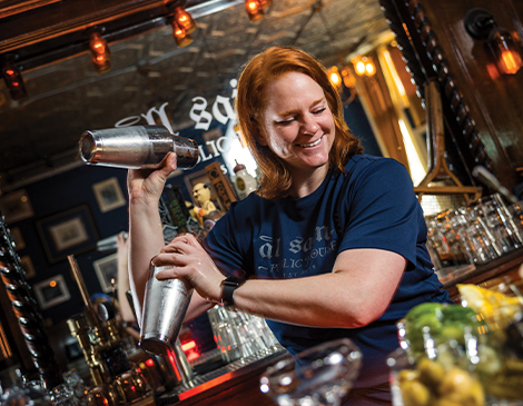 West-Article-Katie-Barto Katie Barto mixing a drink behind the bar