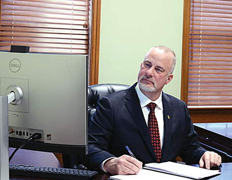 meet-the-mayor-article Brecksville mayor Daryl Kingston sitting at his desk