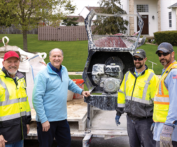 Public Service Director Paul Barnett with construction workers
