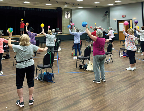 seniors participating in a fitness class