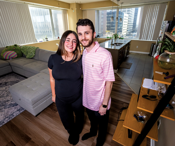 Ally Costello standing in Downtown Cleveland aparatment