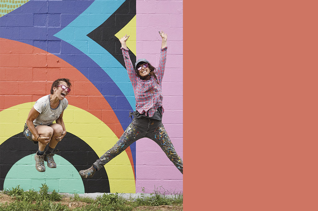 Katey Truhn and Jessie Unterhalter with their mural "Land Ahoy" Katey Truhn and Jessie Unterhalter with their mural "Land Ahoy"