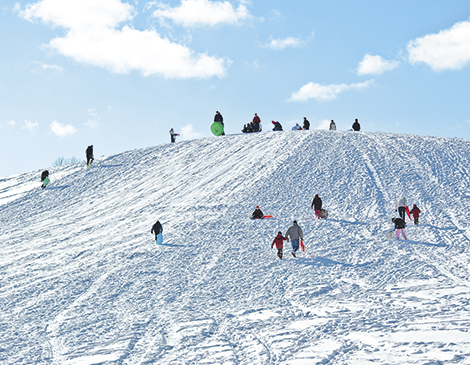The sledding hill at Kendall Hills in the Cuyahoga Valley National Park offers sledders room  to spread out. The sledding hill at Kendall Hills in the Cuyahoga Valley National Park offers sledders room  to spread out.