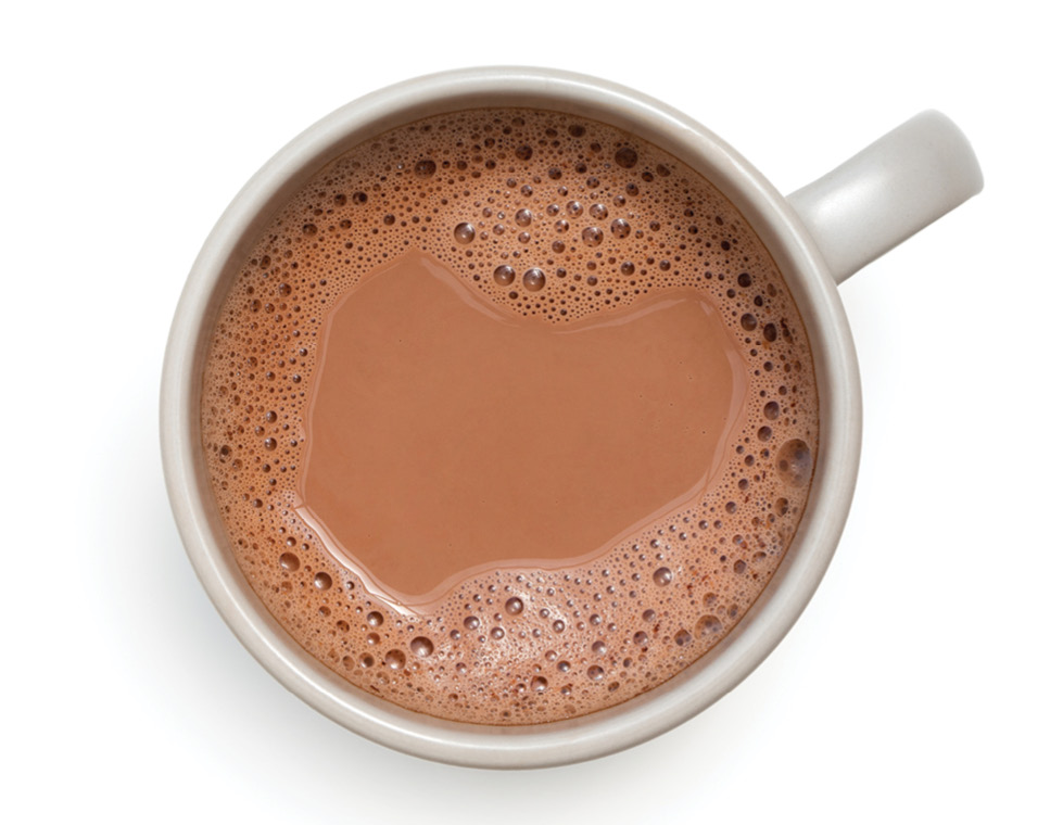 An overhead view of a mug of hot chocolate