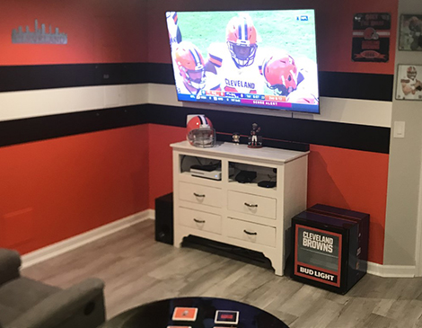 Cleveland Browns fan  Luke Rowan outfitted his basement in brown and orange for this year’s season. Cleveland Browns fan  Luke Rowan outfitted his basement in brown and orange for this year’s season.