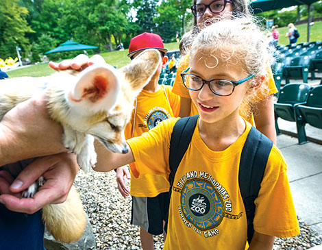 Cleveland Metroparks Zoo‘s camps give kids close up encounters with animals. 