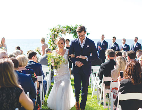  Erin Shaffer and Stewart Clark nodded to  their love of travel throughout their wedding at the Shoreby Club