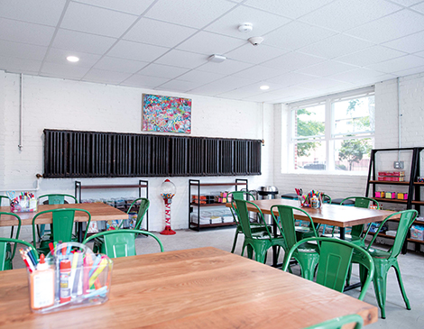 The I Promise Village offers community spaces, including an art room for families.  The I Promise Village offers community spaces, including an art room for families.