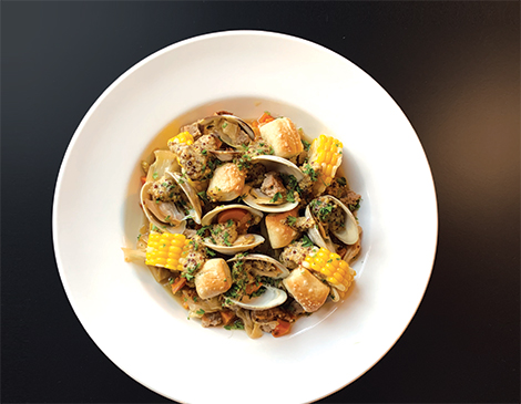 The new Little Italy restaurant from Emily Gilbert and Victor Morenz offers comfort food such as the clambake choucrote. The new Little Italy restaurant from Emily Gilbert and Victor Morenz offers comfort food such as the clambake choucrote.