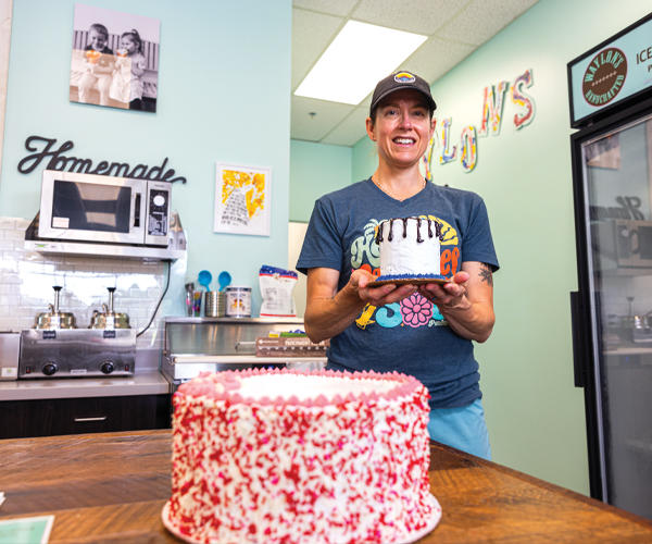 Woman holding ice cream cake