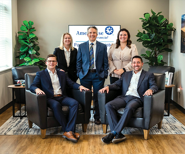 Ameriprise team posing in office