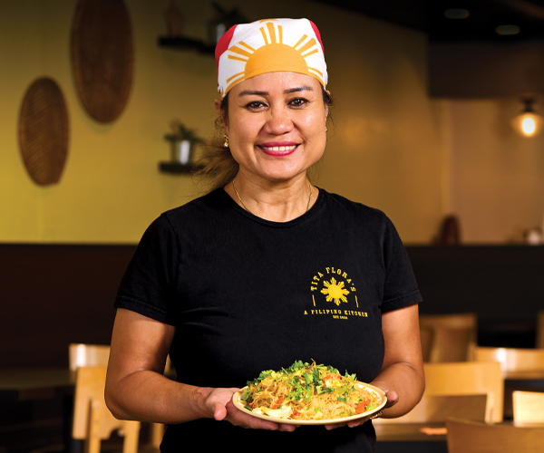 Woman holding a plate of food