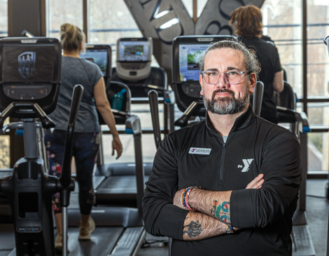 Kevin Born-Crow inside YMCA fitness area