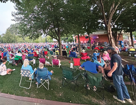 People enjoying outdoor live music