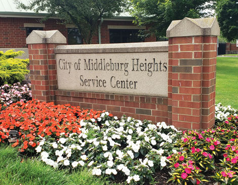 service-department-article Middleburg Heights Service Center sign with flowers around it