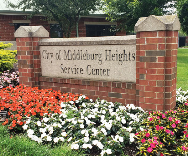 Middleburg Heights Service Center sign with flowers around it