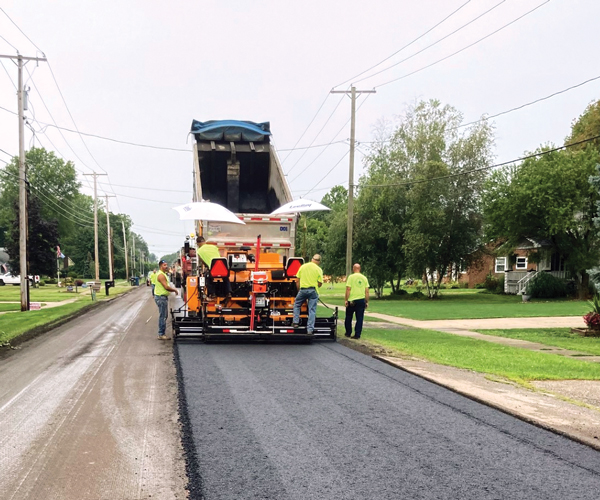 North Ridgeville Public Works Department repaving the road