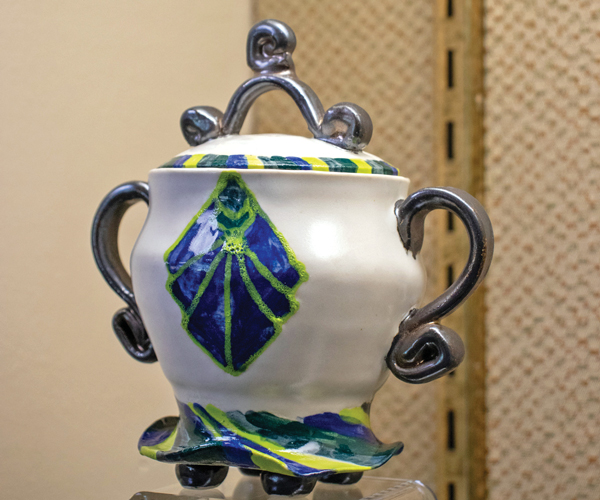 a piece of white and blue pottery