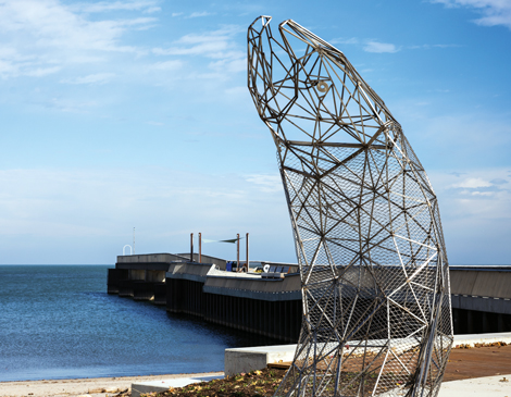 a metal fish sculpture at Bradstreet's Landing