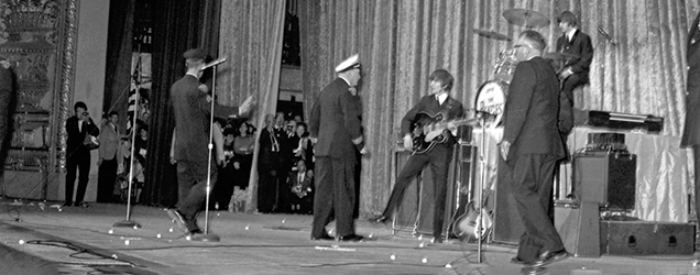 Cleveland Police force the Beatles off stage in the band's first appearance in 1964.