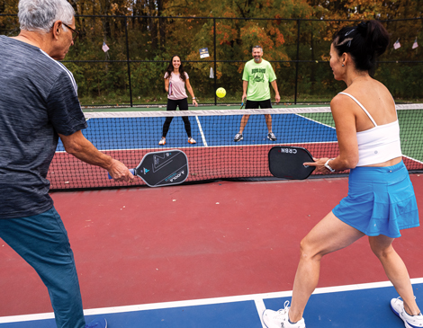 solon-community-park-article Four people playing pickleball