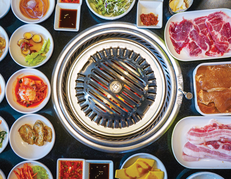 solon-restaurants-gogi-en An overhead view of a tabletop grill for Korean Barbecue