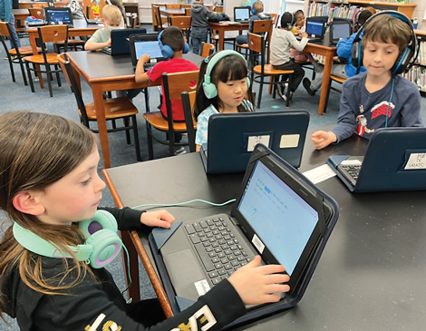 solon-school-article Young students of Solon schools using laptops