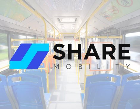 solon-share-mobility-article The Share Mobility logo over a photo the inside of a bus