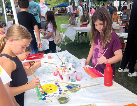 Kids painting at Strongsville's Day at the Chalet