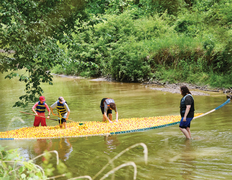 People setting up the Strongsville Duck Race