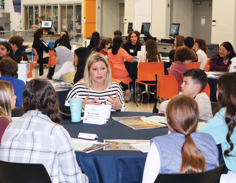 schools-article Strongsville students meeting with a local business leader