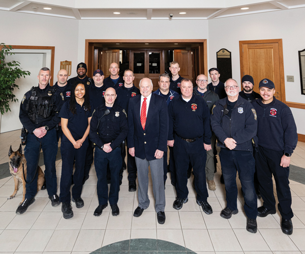 A group photo of Westlake city police officers, firefighters, and mayor